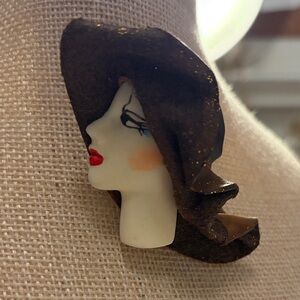 Elegant Black and White Face Brooch